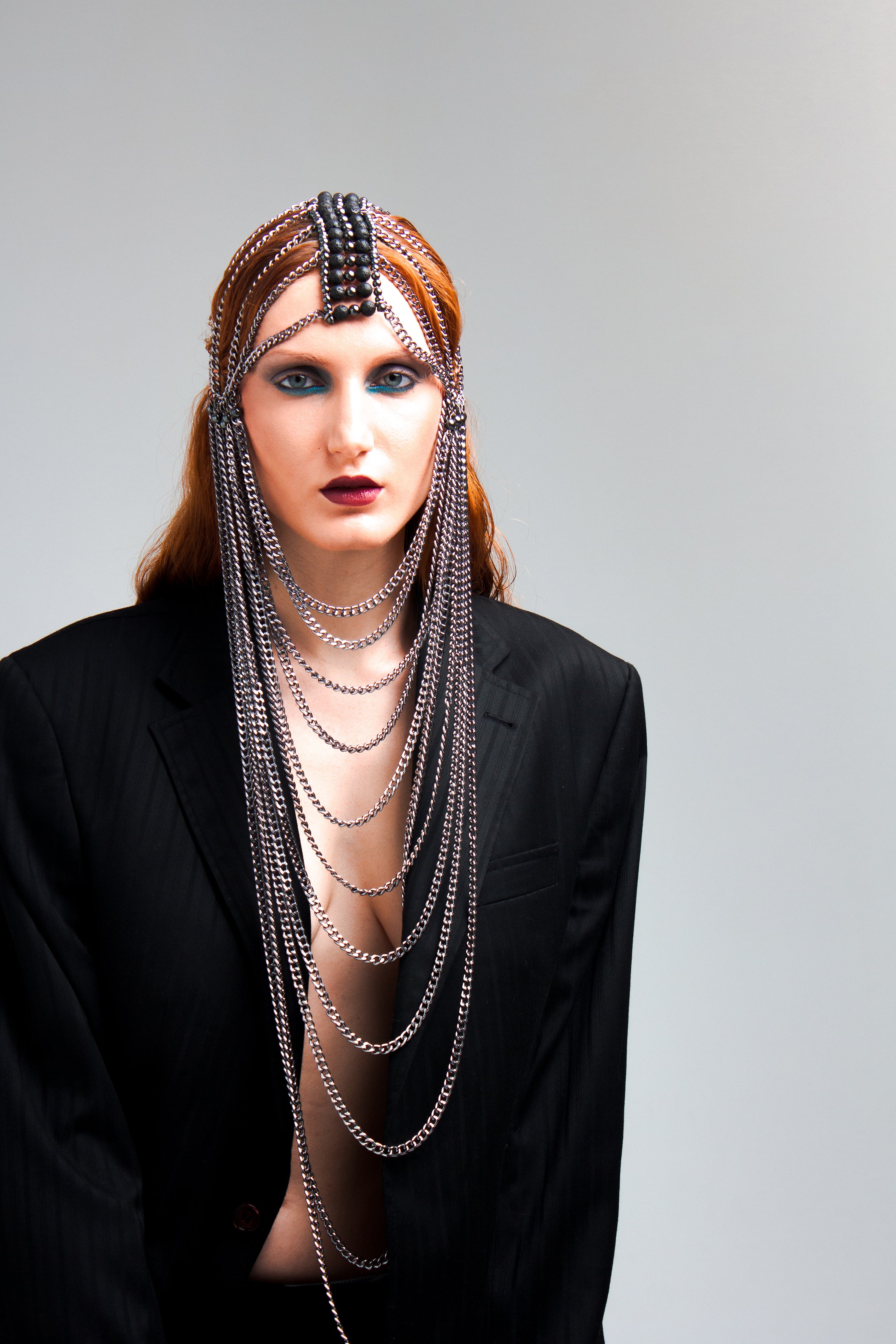 Silver chain mask with lava stone