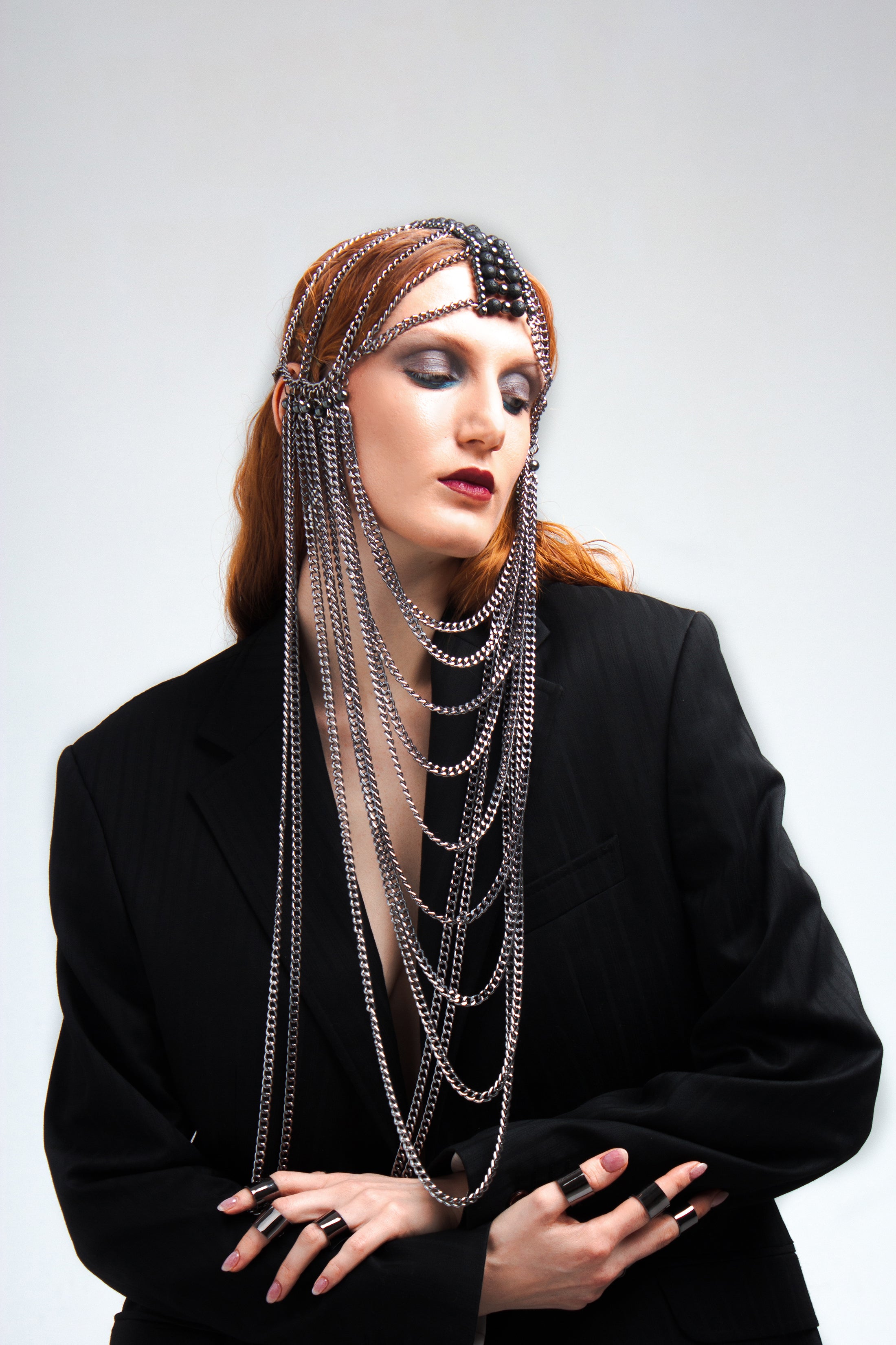Silver chain mask with lava stone