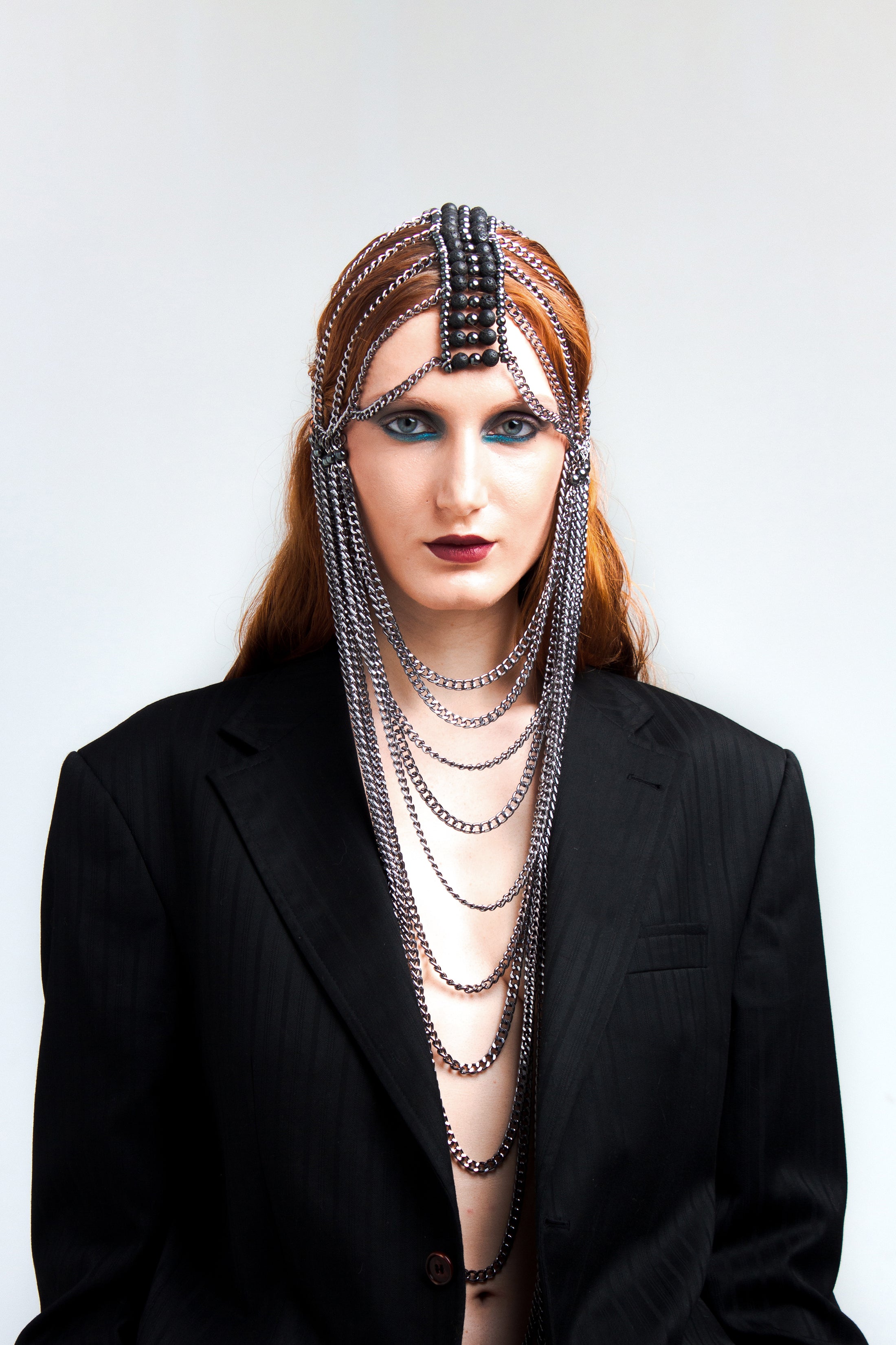 Silver chain mask with lava stone