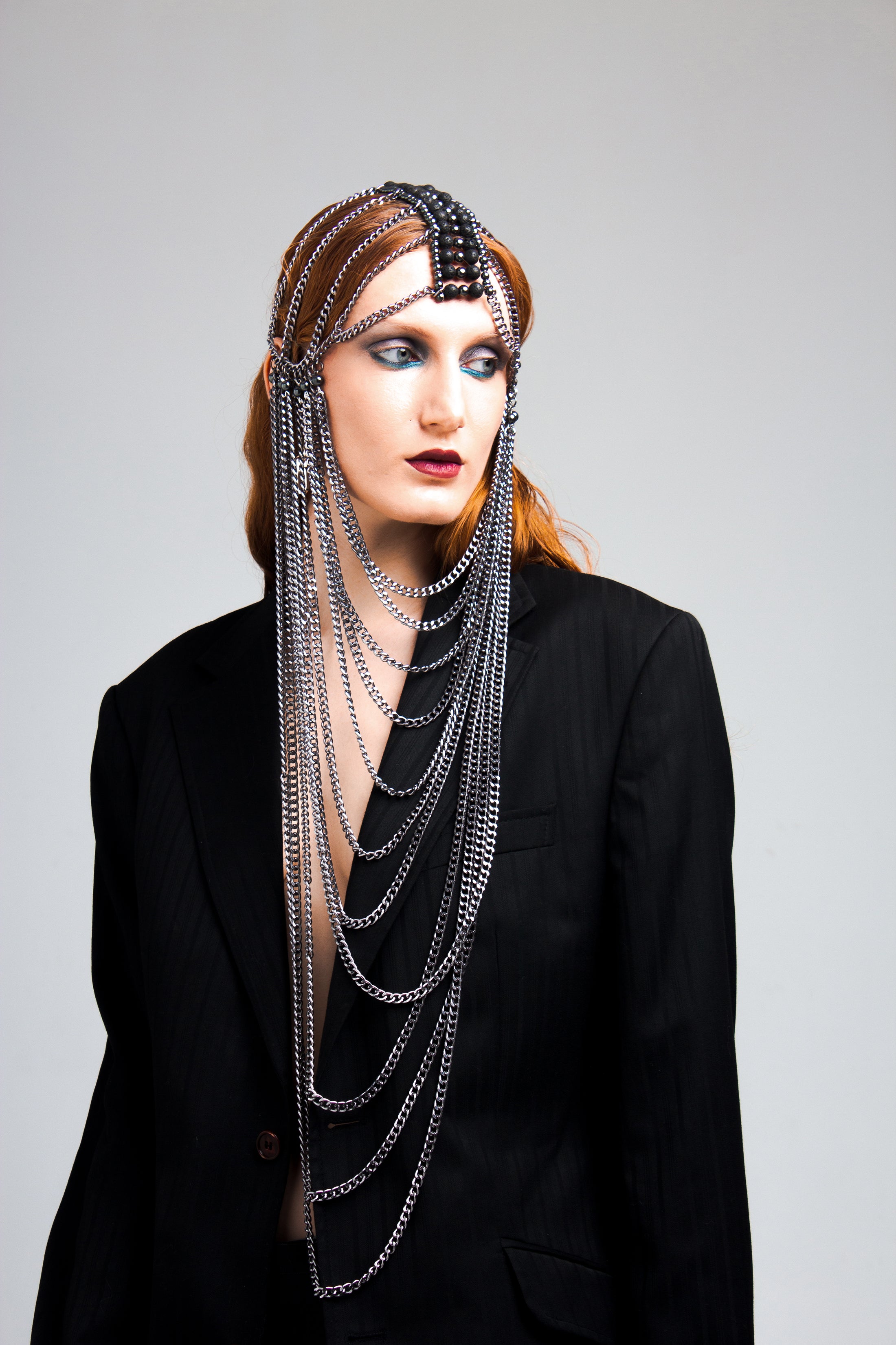 Silver chain mask with lava stone